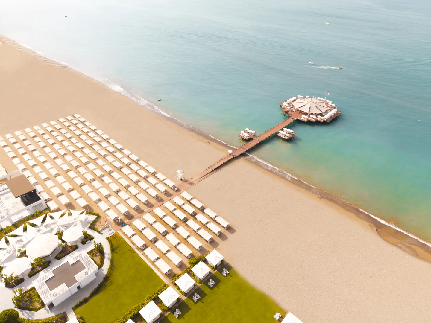 Aerial view of the beach and pier at Sueno Hotels Deluxe Belek